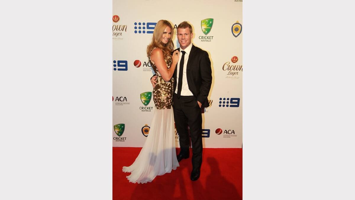  David Warner and Candice Falzon arrive at the 2014 Allan Border Medal on Monday night. Picture: Ben Rushton 