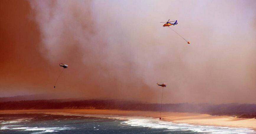 Planes in action over the Dunbogan fire.