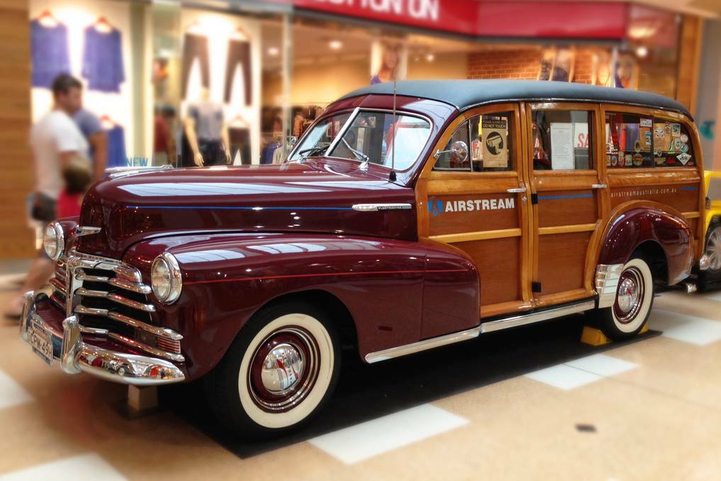 They call it a "Woodie": Nostalgia is on show at Port Central Shopping Centre for The Port Macquarie Beatles Festival in the form of a 1947 Chevrolet Fleetmaster wagon. Pic: Port News