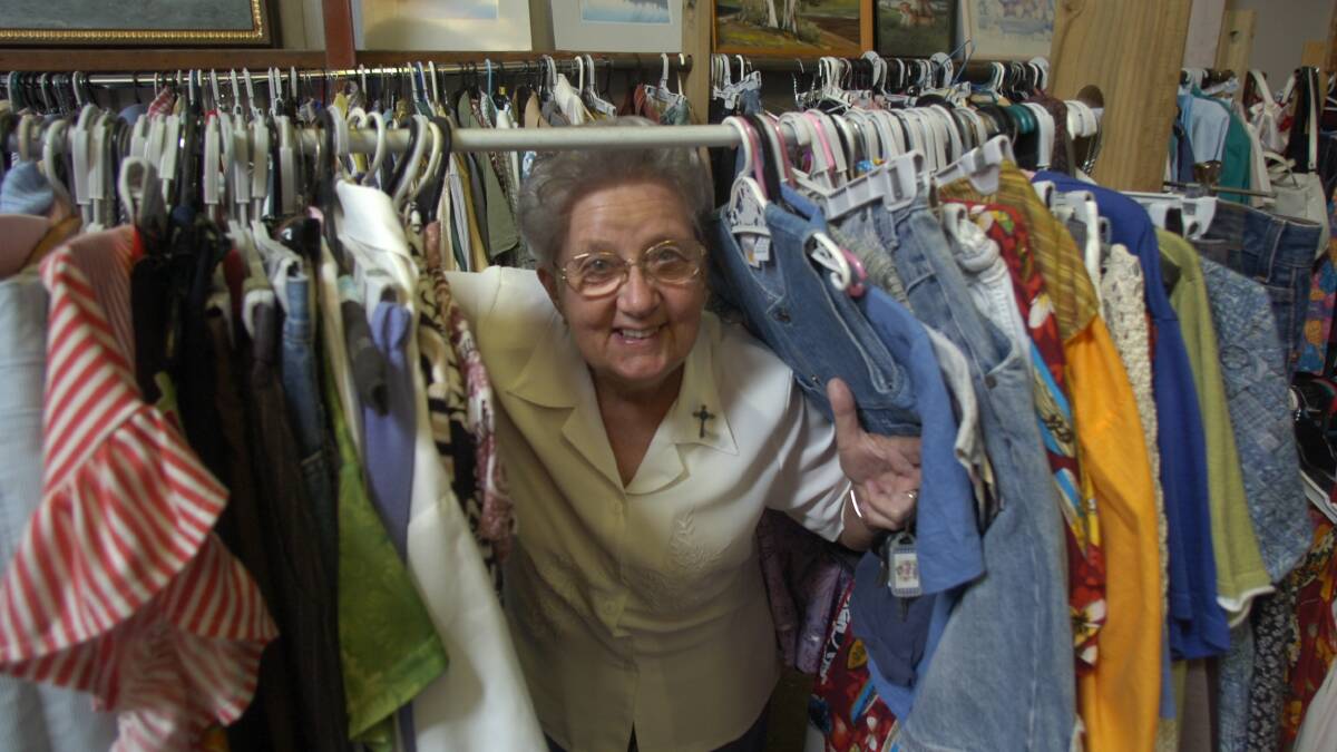 Selfless: Sister Marjorie McLachlan OAM posing for a Port News photo back in 2008. Here she shows some of the second-hand goods her charity sold to help fund the Soup Kitchen.