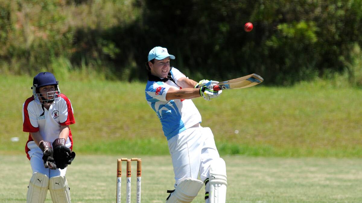 Lofted shot: Chris Cole hitting out for Port City Leagues Magpies on Saturday. His team beat Camden Haven in an interesting match at Wayne Richards Park. Pic: PETER GLEESON