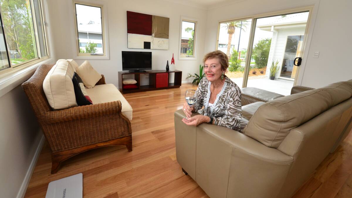 Exciting: Jan Warrington has swapped life in a Port Macquarie villa for the new Ocean Club Resort at Lake Cathie. Pic: NIGEL McNEIL