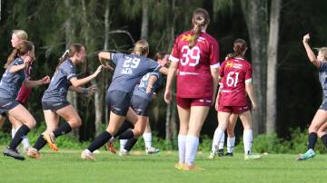 Mid Coast under 17s celebrate a goal during a match in the Northern NSW Youth League at Taree this year. They meet Maitland in the youth league cup final at Maitland on Sunday. Picture Mid Coast Football.